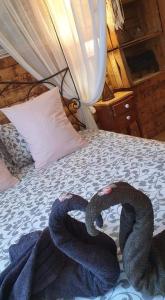 Postel nebo postele na pokoji v ubytování Chambre d'hôtes Le Petit Ranch
