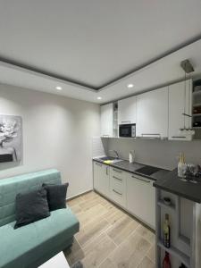 Eldhús eða eldhúskrókur á Apartman Dora