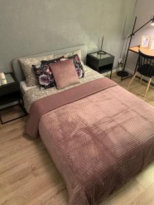 Posteľ alebo postele v izbe v ubytovaní Moderno Apartament
