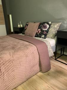Posteľ alebo postele v izbe v ubytovaní Moderno Apartament