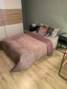 Posteľ alebo postele v izbe v ubytovaní Moderno Apartament