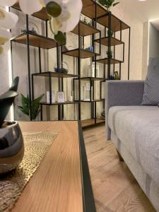Posteľ alebo postele v izbe v ubytovaní Moderno Apartament