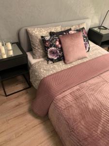 Posteľ alebo postele v izbe v ubytovaní Moderno Apartament