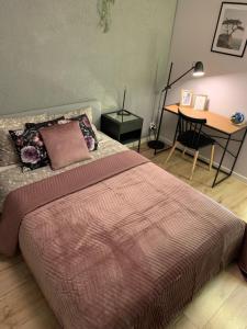Posteľ alebo postele v izbe v ubytovaní Moderno Apartament