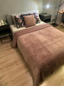 Posteľ alebo postele v izbe v ubytovaní Moderno Apartament
