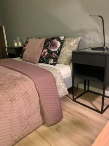 Posteľ alebo postele v izbe v ubytovaní Moderno Apartament