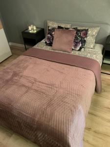 Posteľ alebo postele v izbe v ubytovaní Moderno Apartament