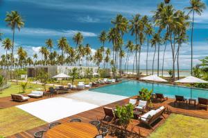 an image of the pool at the resort at Tuju Boutique Hotel in Passo de Camarajibe