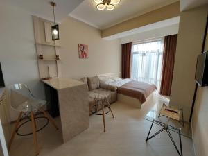 TV a/nebo společenská místnost v ubytování Tsaghkadzor, Alvina Complex Apartment 163