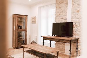 Televízia a/alebo spoločenská miestnosť v ubytovaní Apartamento San Marcial by SanSe Holidays
