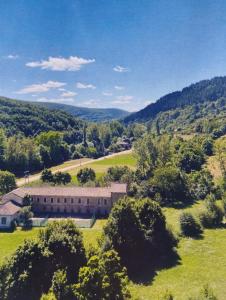 an aerial view of a large building in a field at Canadina 1 in Morgovejo