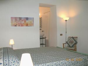 A bed or beds in a room at Umbria Valnerina in Noble Residence near Spoleto Apartment x 4-6 persons