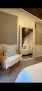 מיטה או מיטות בחדר ב-La Canaria Casa de Campo