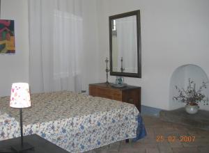 A bed or beds in a room at Umbria Valnerina in Noble Residence near Spoleto Apartment x 4-6 persons