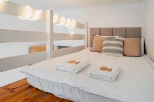 Posteľ alebo postele v izbe v ubytovaní Warsaw Concierge Wilanowska