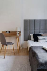 Posteľ alebo postele v izbe v ubytovaní Warsaw Concierge Wilanowska
