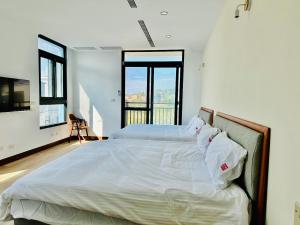 Krevet ili kreveti u jedinici u objektu 浯島文旅WD Hotel