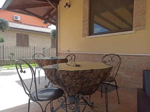 Patio nebo venkovní prostory v ubytování BELLA ASSISI B & B