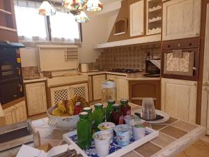 Kuchyň nebo kuchyňský kout v ubytování BELLA ASSISI B & B
