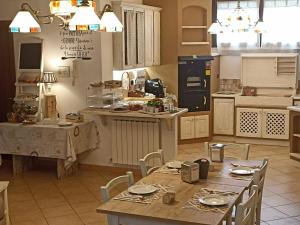 Kuchyň nebo kuchyňský kout v ubytování BELLA ASSISI B & B
