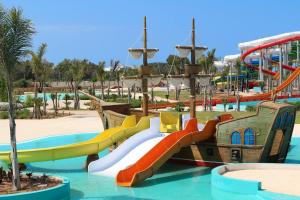 a water park with a slide in the water at place to be saidia in Saïdia