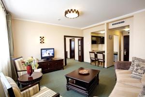 TV a/nebo společenská místnost v ubytování Hotel Tecadra