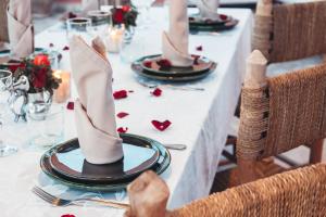 a table with a table set with shoes on it at Riad Dar Elma And Spa in Marrakesh +71 photos
