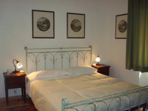 เตียงในห้องที่ Albergo La Sfinge