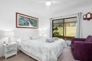 Laurelview Scenic Inn Gympie客房内的一张或多张床位