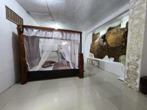 Voodi või voodid majutusasutuse Jungle Inn Bukit lawang toas