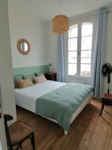 Posteľ alebo postele v izbe v ubytovaní DOLUS, Maison à 10 min. de la plage!