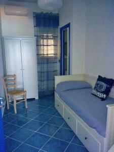 Postel nebo postele na pokoji v ubytování B&B Mammaliturchi SCALA DEI TURCHI