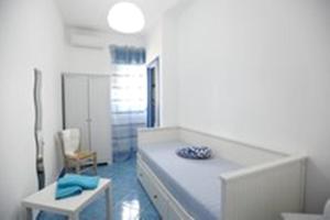 Postel nebo postele na pokoji v ubytování B&B Mammaliturchi SCALA DEI TURCHI