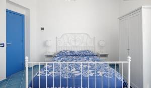Postel nebo postele na pokoji v ubytování B&B Mammaliturchi SCALA DEI TURCHI