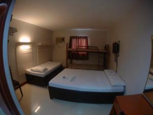 Postel nebo postele na pokoji v ubytování D' Loft Inn CDO