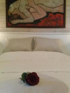 Cama ou camas em um quarto em B&B The Aum-House