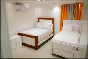 Postel nebo postele na pokoji v ubytování Casa Ocean Blu3