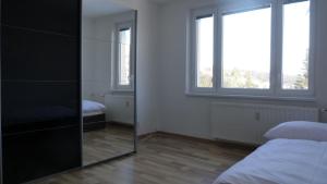 Postel nebo postele na pokoji v ubytování Apartmanovy byt pri Zubačke