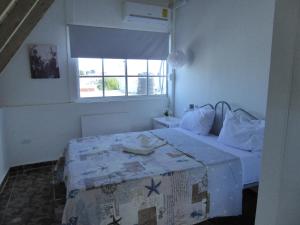 Postel nebo postele na pokoji v ubytování CortLang Vacation Rentals, El Pueblito