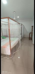 Voodi või voodid majutusasutuse Sasagara Beach Villa toas