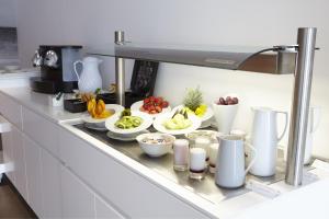 Una cocina o zona de cocina en Ibiza Sun Apartments