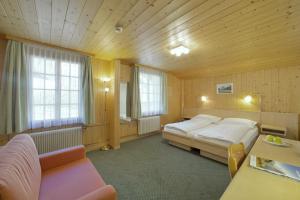 Postel nebo postele na pokoji v ubytování Hotel Alpenruh