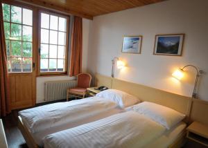 Voodi või voodid majutusasutuse Hotel Alpenruh toas