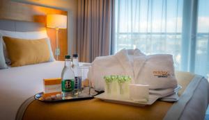 Cama ou camas em um quarto em Maldron Hotel Smithfield Dublin City