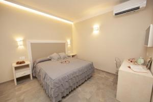 Postel nebo postele na pokoji v ubytování Podere Grandolfi B&B + 37 fotografií