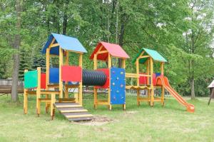 a set of playground equipment in a park at Ośrodek Wypoczynkowy Diuna Beskidy in Korbielów