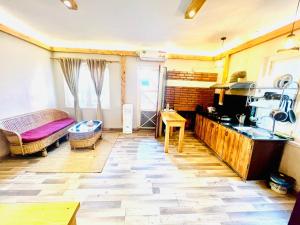 Kuchyň nebo kuchyňský kout v ubytování Silu Homes by Hostmandu