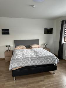 Ліжко або ліжка в номері Helgrindur Guesthouse