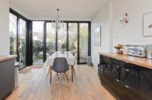 Interior designed house with garden in North West London by UnderTheDoormat