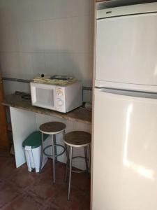 Kuchyň nebo kuchyňský kout v ubytování Casa Rural Concejo 1 + 5 fotografií